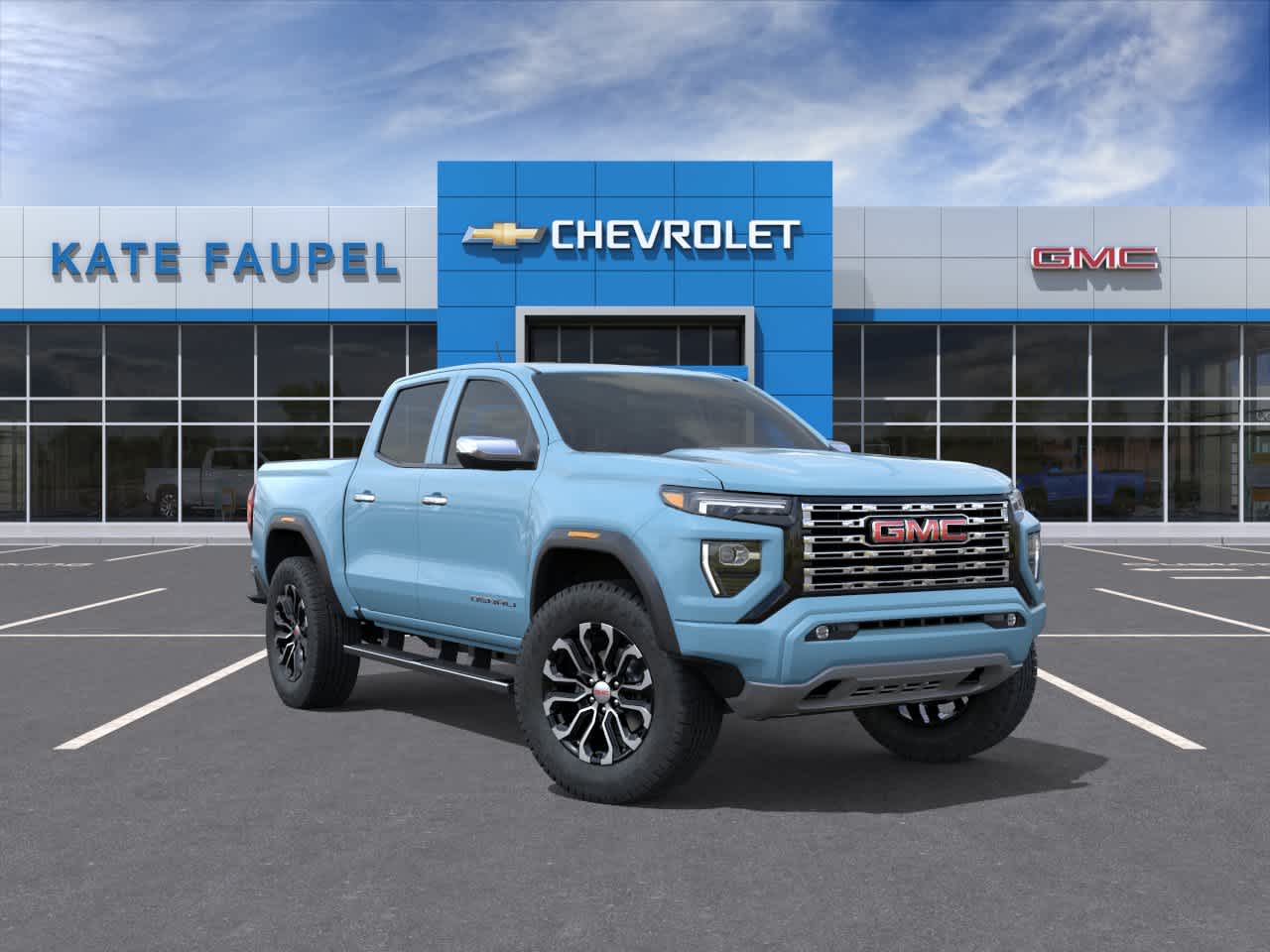 2026 GMC Canyon Denali in Glacier Metallic — front three-quarter view