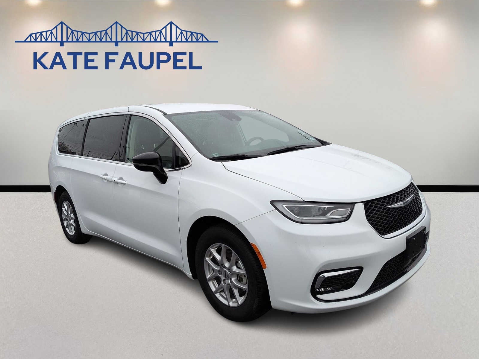 2024 Chrysler Pacifica Touring L in White — front three-quarter view