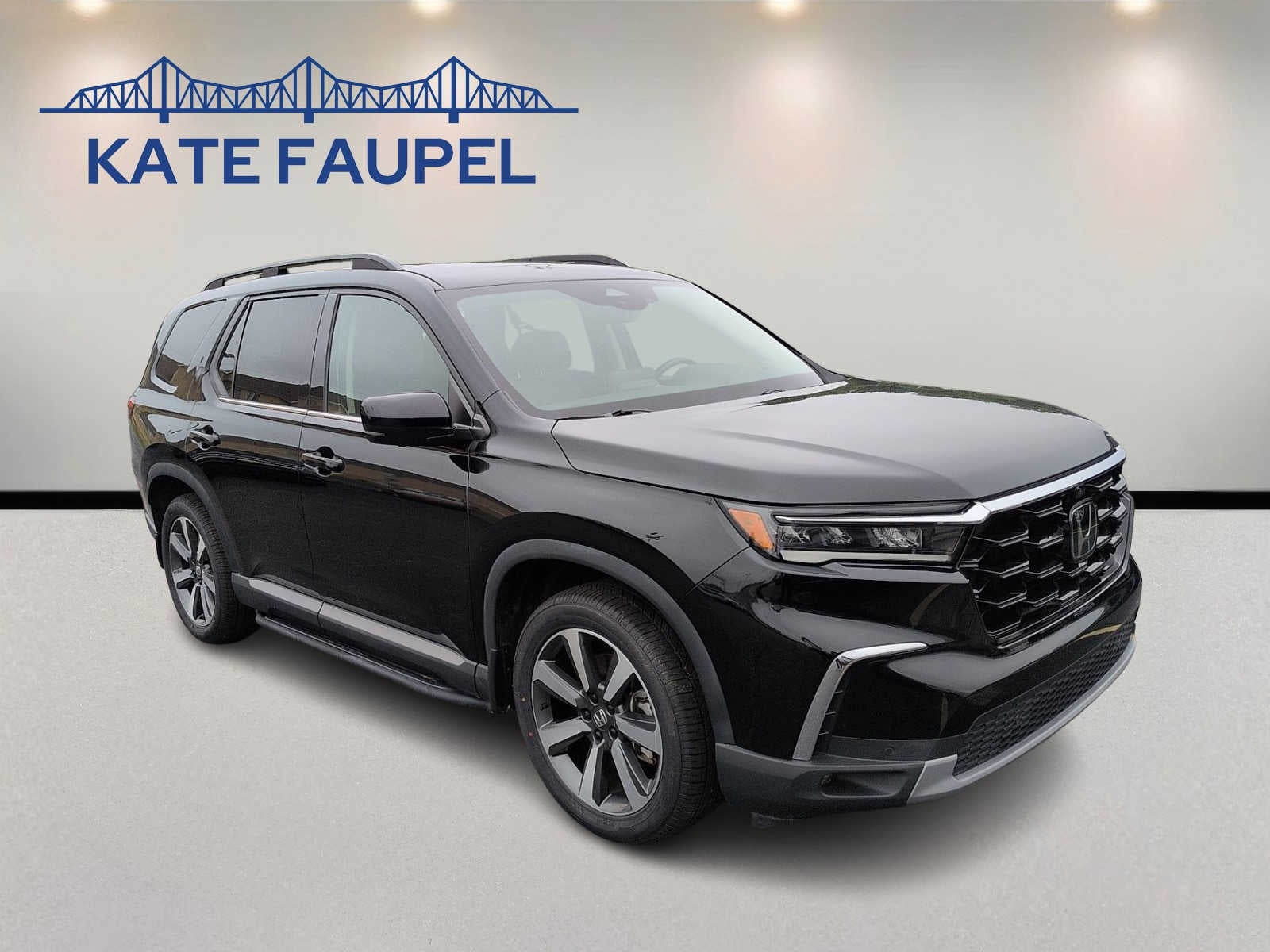 2024 Honda Pilot Elite in Black — front three-quarter view