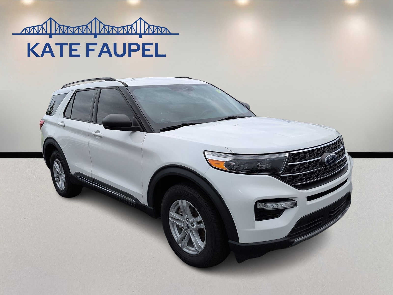 2022 Ford Explorer XLT in Star White Metallic Tri-Coat — front three-quarter view