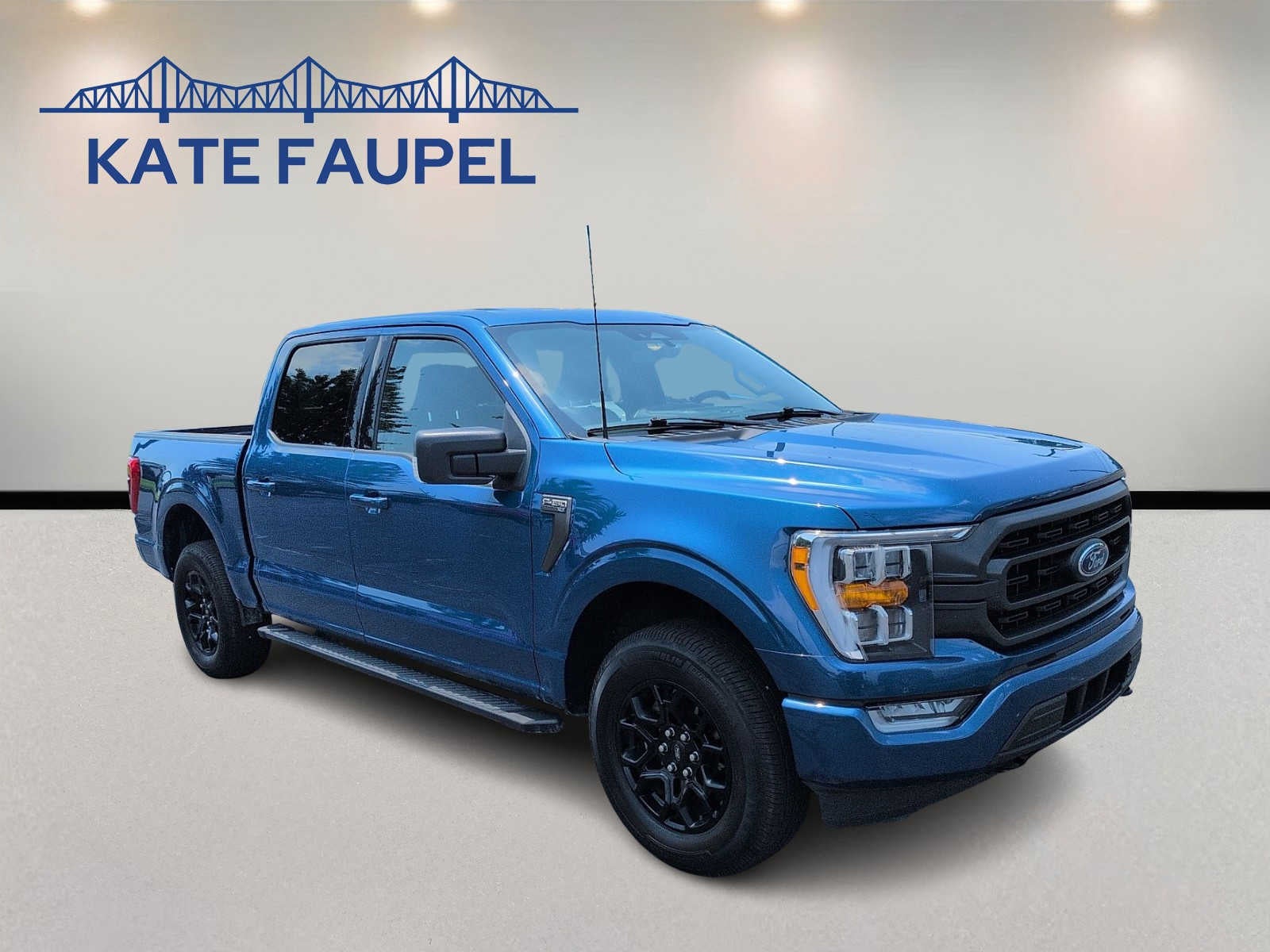 2023 Ford F-150 XLT in Atlas Blue Metallic — front three-quarter view