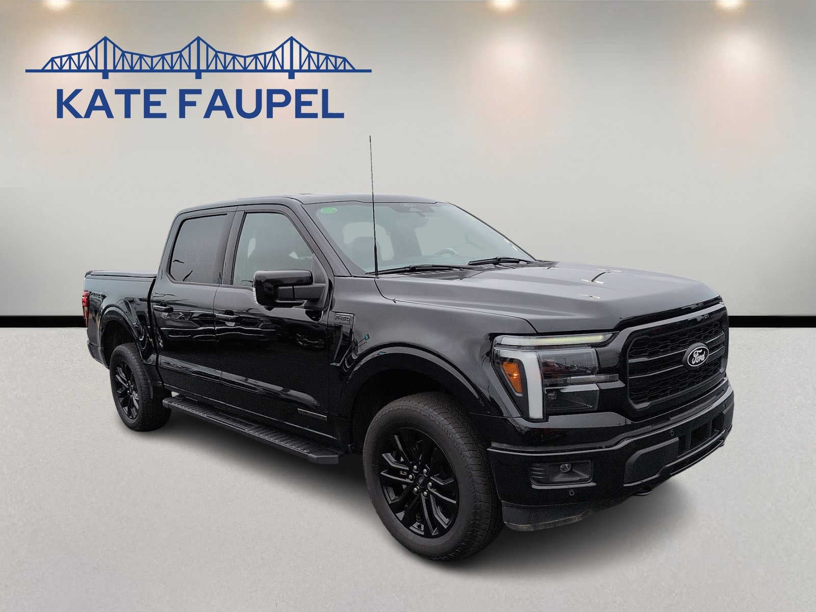 2025 Ford F-150 LARIAT in Agate Black Metallic — front three-quarter view