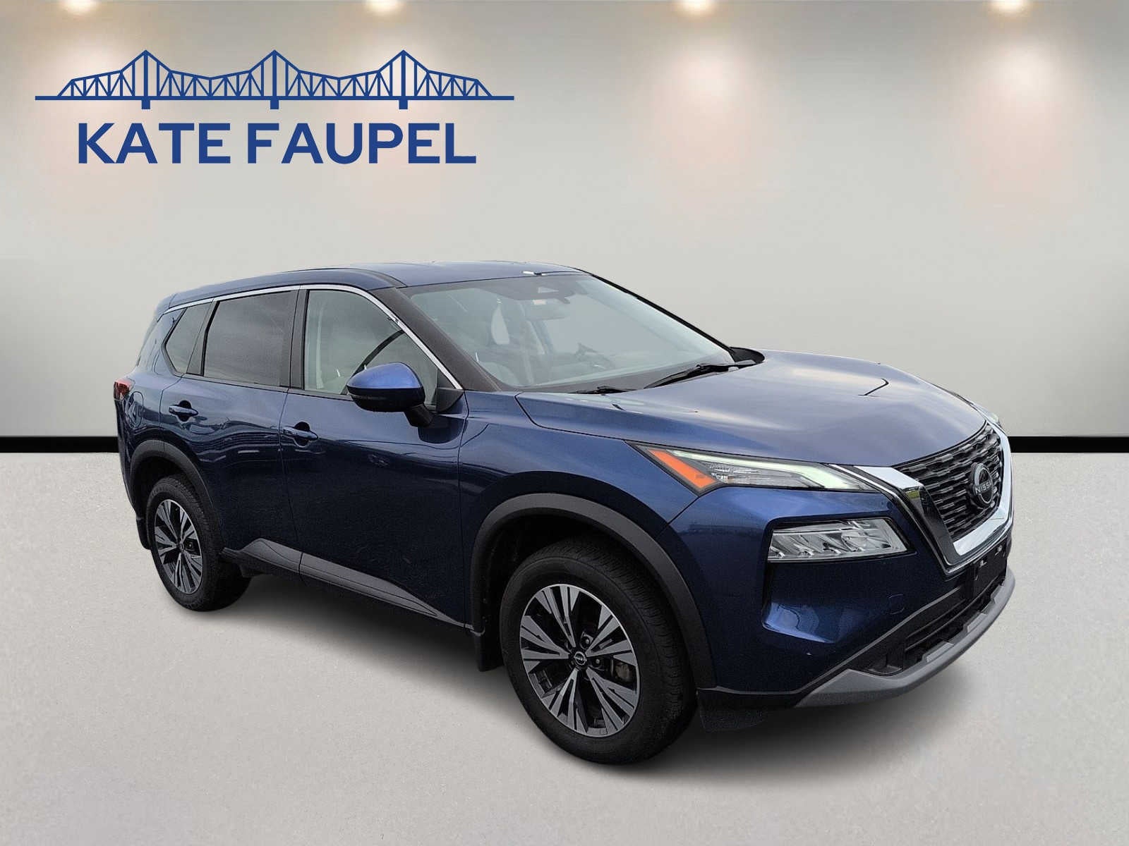 2023 Nissan Rogue SV in Caspian Blue Metallic — front three-quarter view